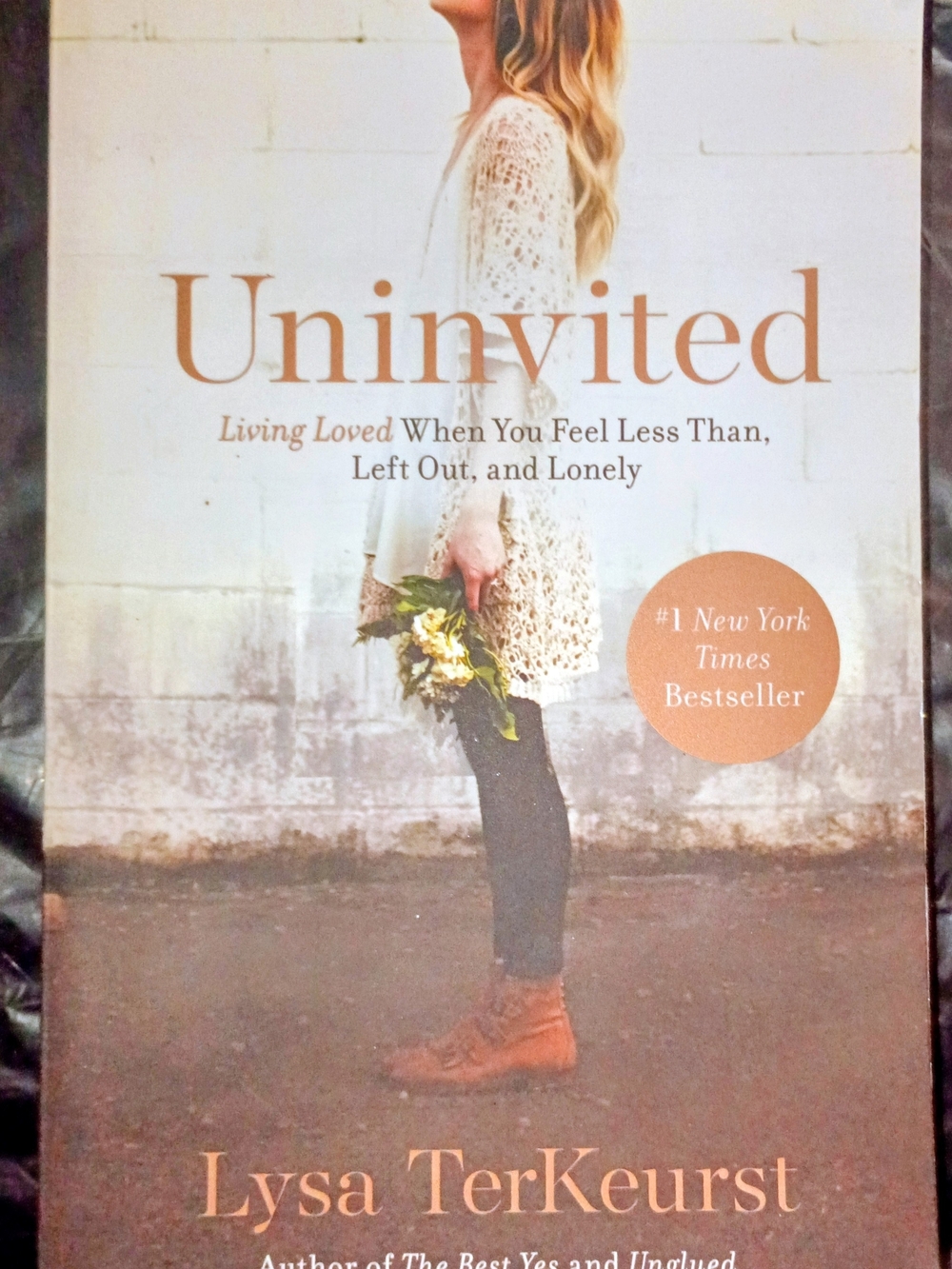 Uninvited by Lysa TerKeurst — Paperback Book in Cream and Brown Cover